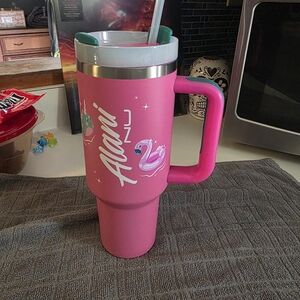 Pink Alani energy drink tumbler